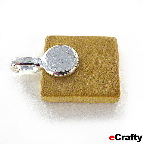 Voila! A finished scrabble tile necklace in under a minute! Scrabble Tile Necklace DIY