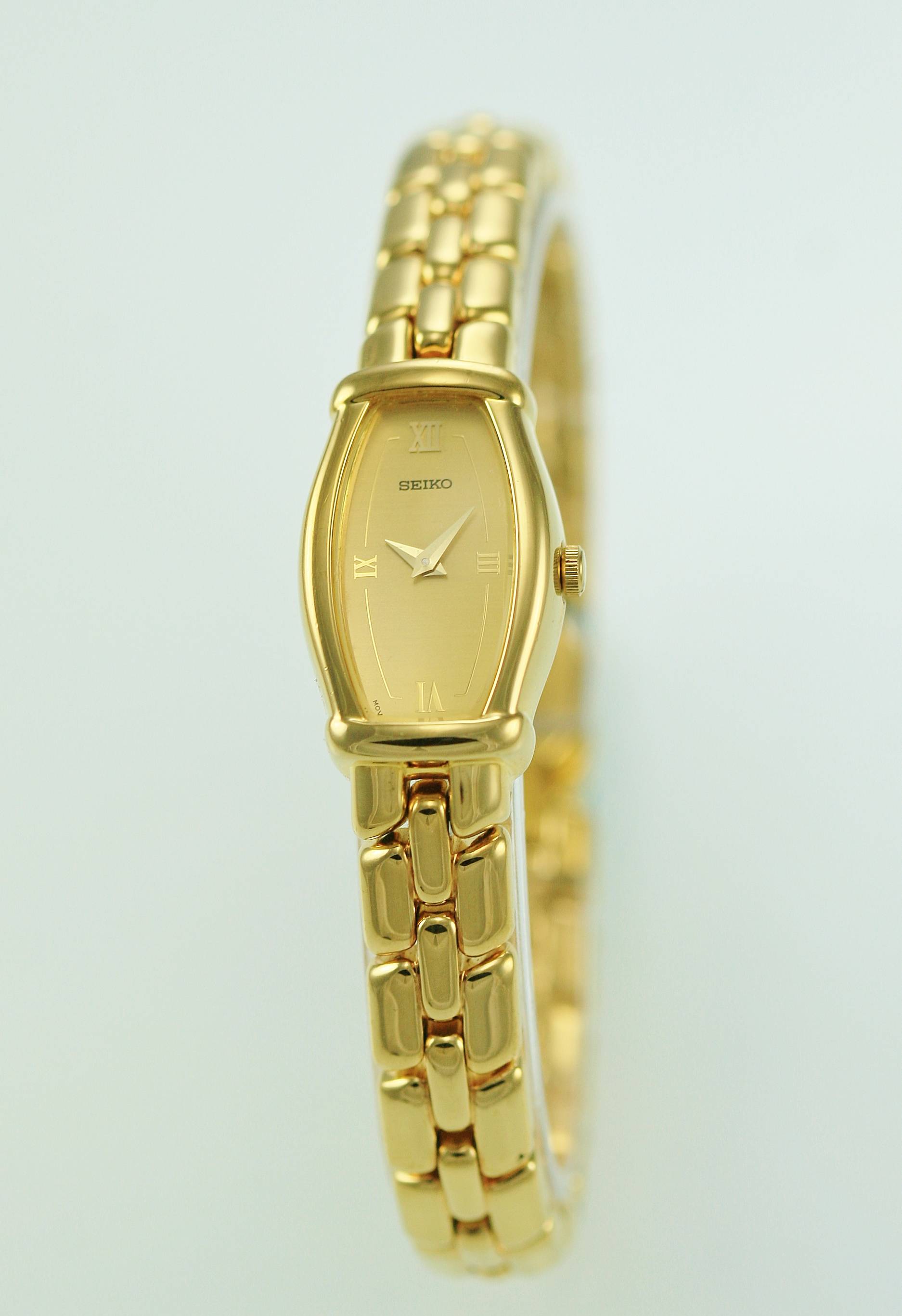 Seiko Women's Gold Tone Easy Read Oval Quartz Bracelet Jewelry Watch