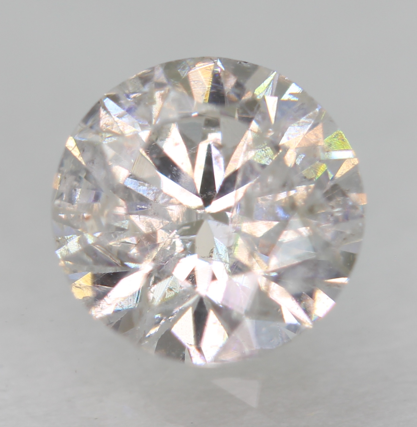 Certified 0.58 Carat F SI2 Round Brilliant Natural Enhanced Loose Diamond 5.34mm