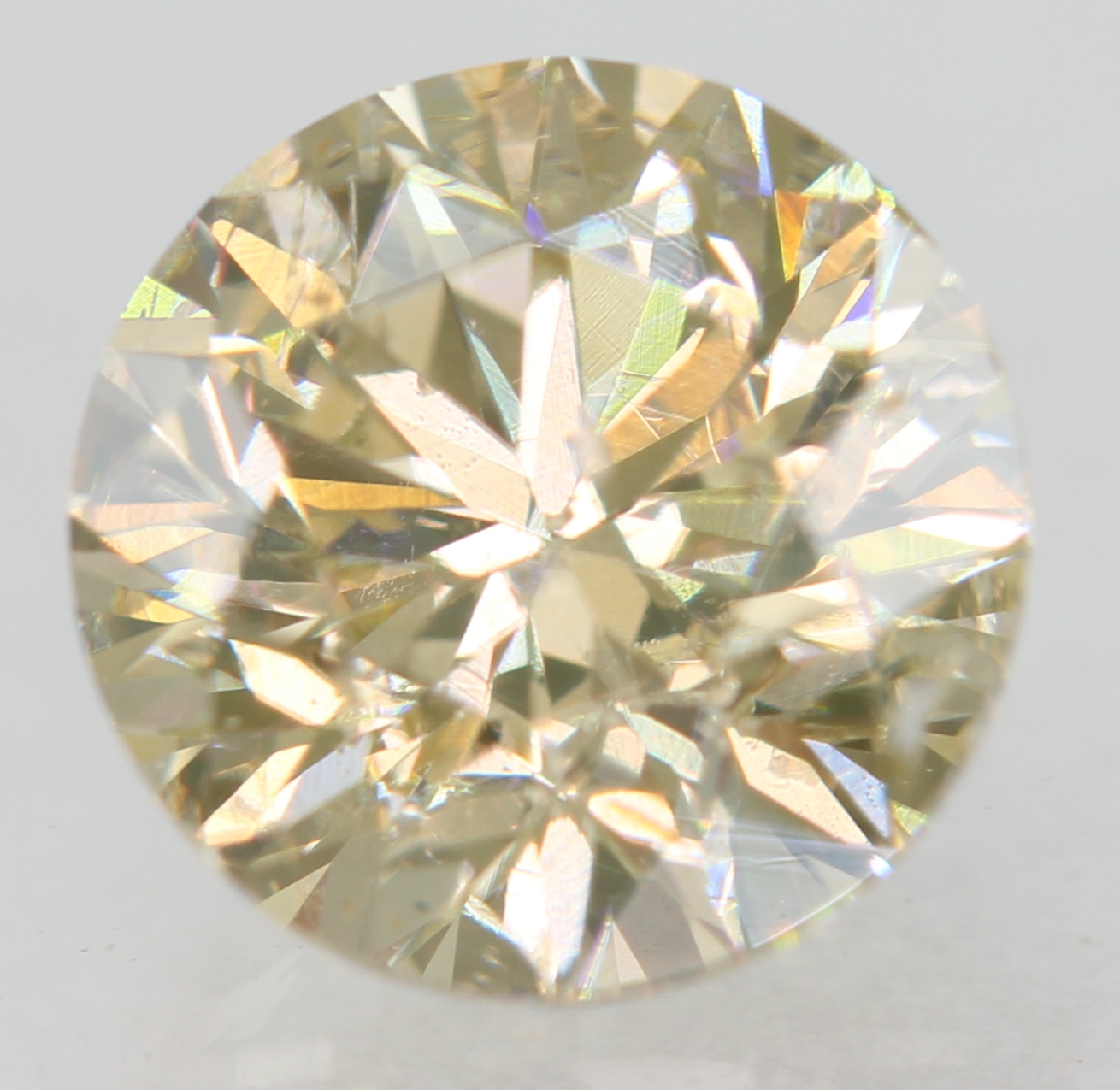 Cert 0.80 Carat Fancy Yellow VS2 Round Brilliant Natural Enhanced Diamond 5.68mm