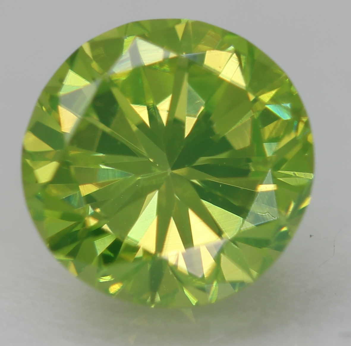 0.49 Carat Lemon Green VVS2 Round Brilliant Natural Enhanced Diamond 4.98m VIDEO