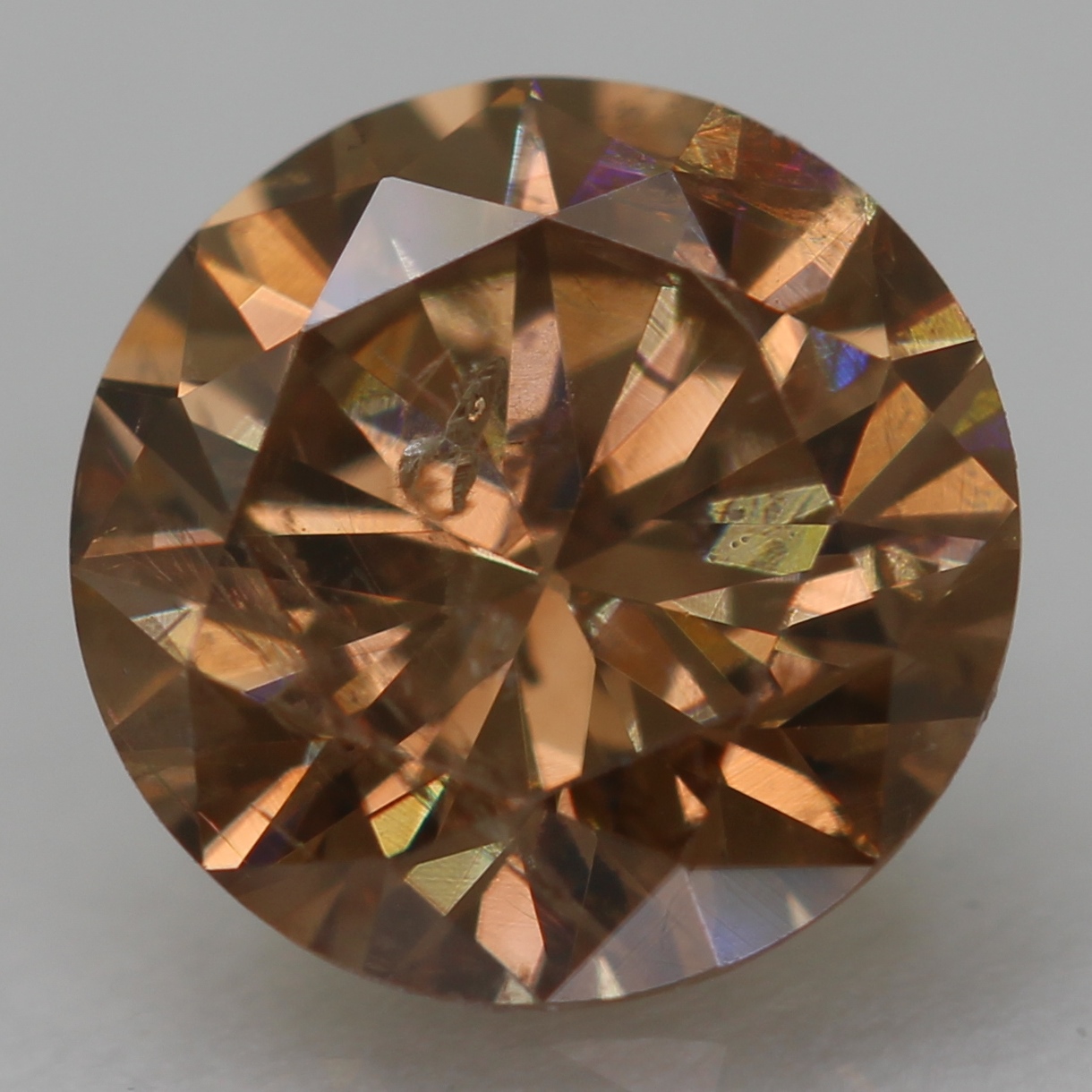 0.55 Carat Yellow Brown SI2 Round Brilliant Natural Enhanced Diamond 5.32m VIDEO
