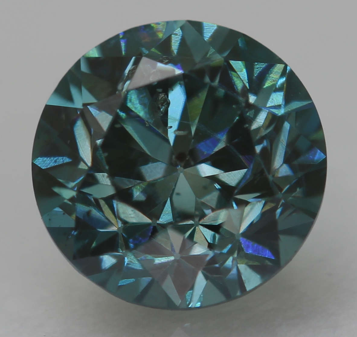 0.51 Carat Vivid Blue SI1 Round Brilliant Natural Enhanced Diamond 4.89mm VIDEO