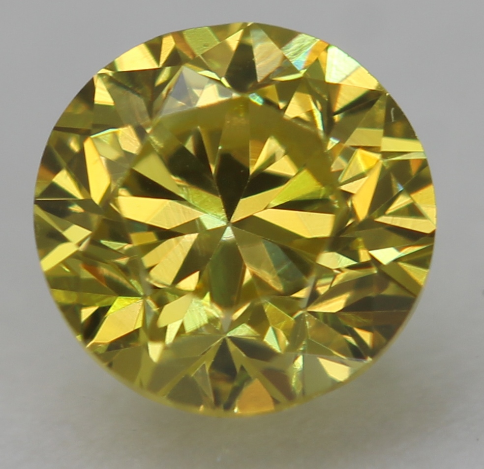 0.30 Ct Canary Yellow VVS2 Round Brilliant Natural Enhanced Diamond 4.11mm VIDEO