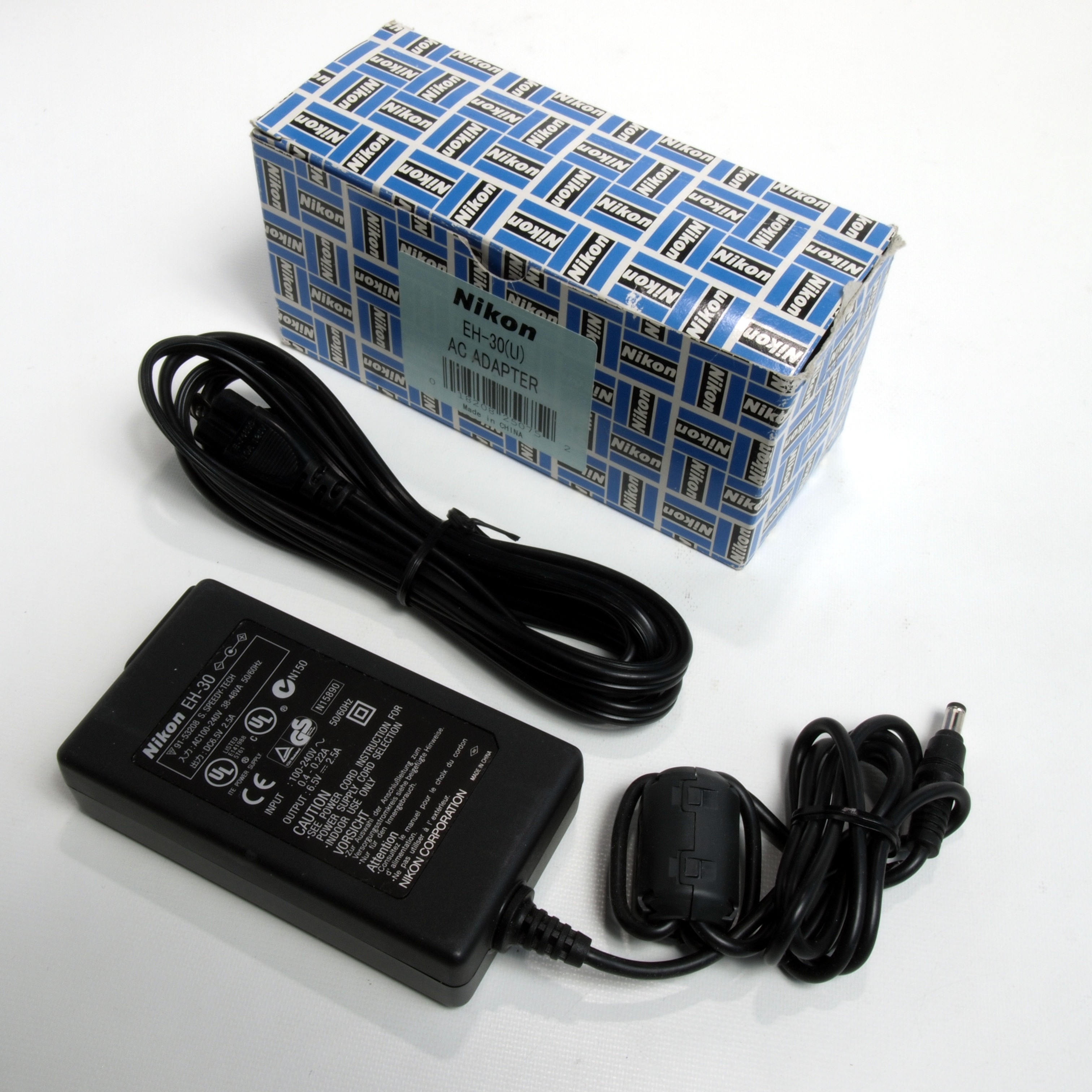 This is a new/old stock Nikon EH-30 (U) AC adapter for Nikon Coolpix 700,  800, 900 & 950 Digital Cameras. The box is slightly shop worn.