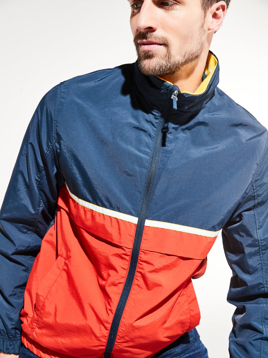 Image of Mens red and navy windbreaker jacket long sleeve zip front pockets - Navy